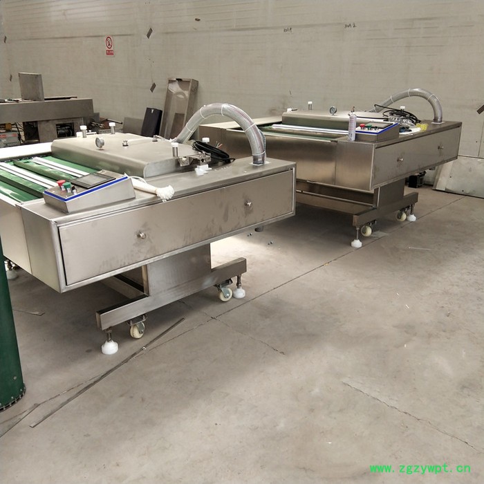 义康牌GDS-1000型连续式真空包装机  羊蹄真空包装机  羊杂滚动式包装机图3