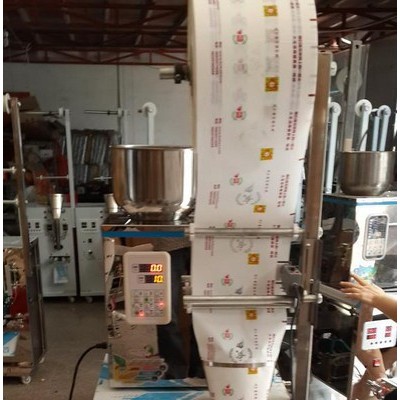 茶叶颗粒多功能包装机五谷杂粮包装机食品药材粉剂背封全自动称重包装机械设备