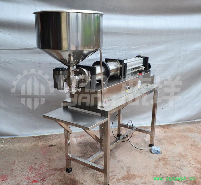 广州半自动卧式气动蜂蜜灌装机活塞式膏体酱料果肉颗粒灌装机