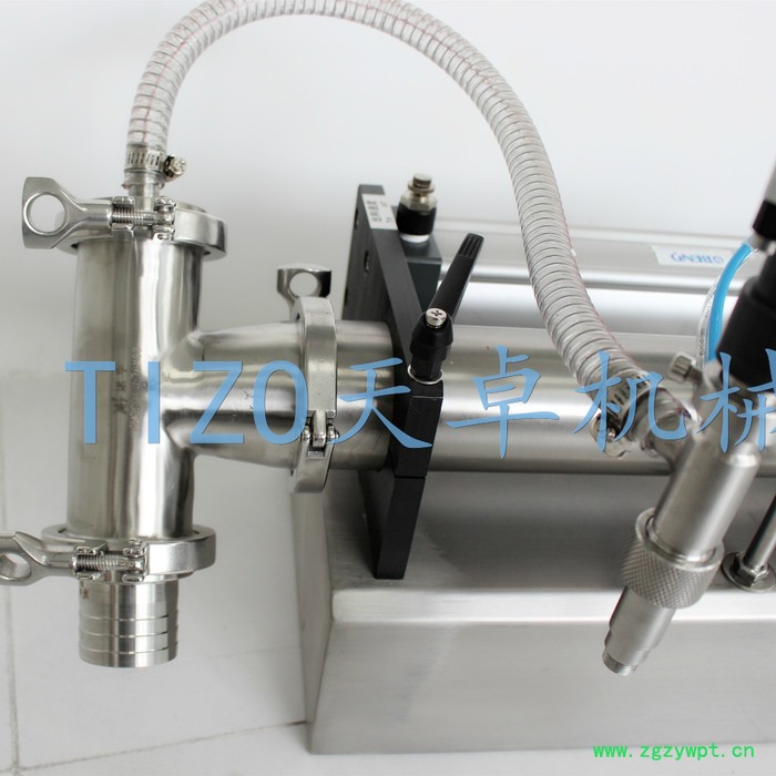 出售天卓TZ-100G半自动液体灌装机 定量液体灌装机 半自动灌装机生产厂家 灌装机械图2